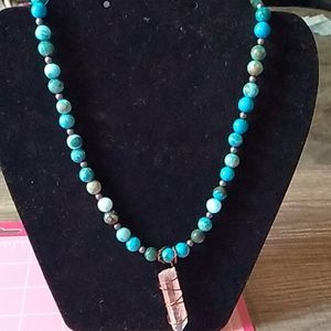 Handmade necklace with quartz crystal pendent